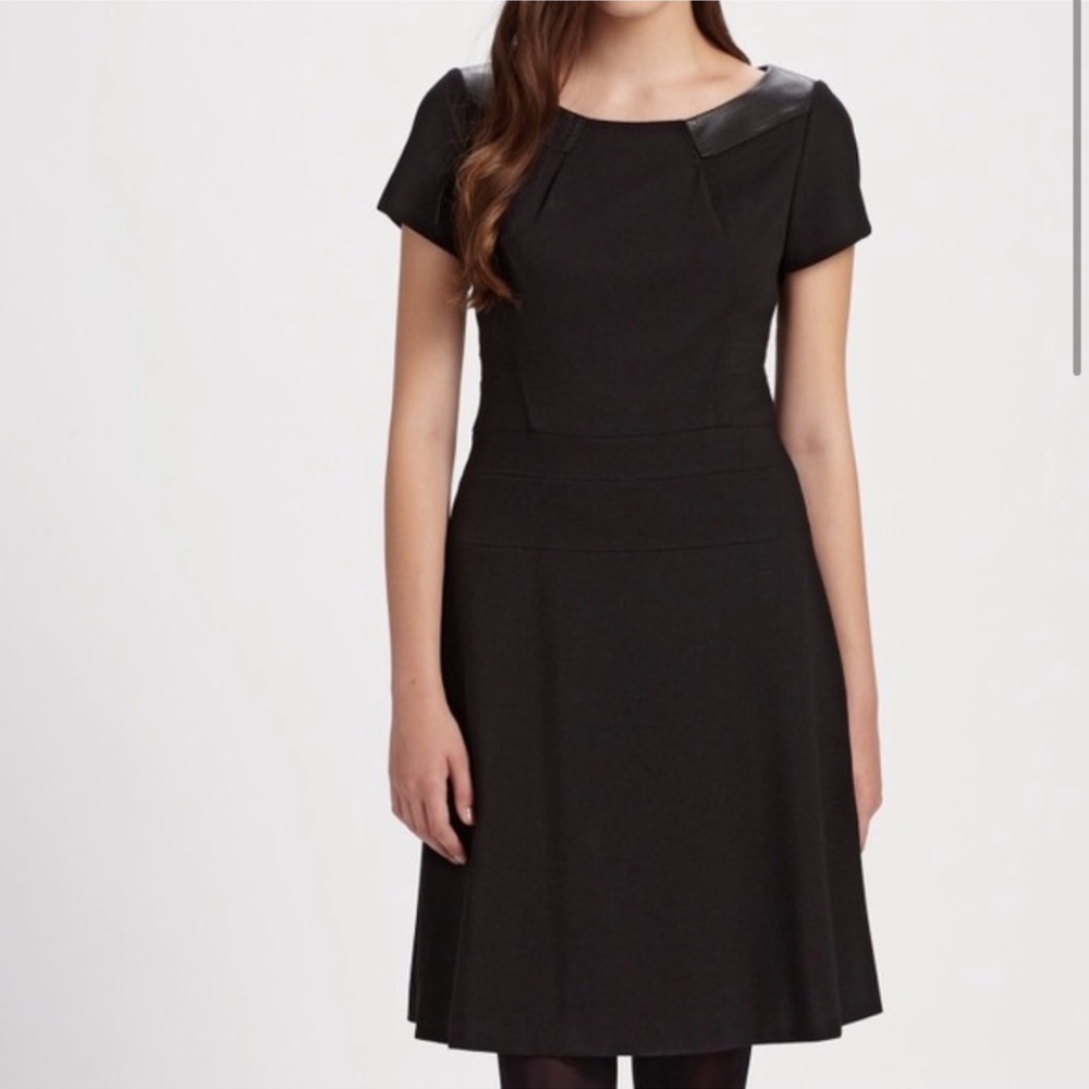 Elie Tahari Joan Black Short Sleeve Dress with Leather like Details. Size 12 NWT
